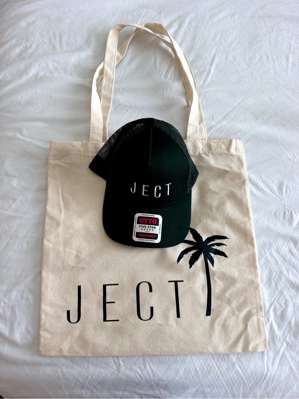 Tote Bag and Trucker Hat via Ject (NY/Palm Beach)